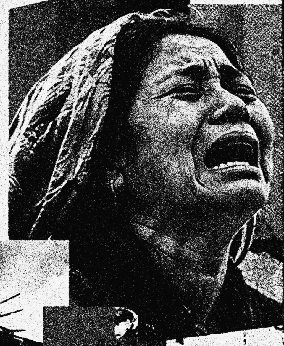 A woman crying out in grief